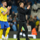 Brighton’s head coach Graham Potter, right, applauds fans at the end of the English Premier League soccer match between Manchester City and Brighton and Hove Albion at the Etihad Stadium in Manchester, England, April 20, 2022.